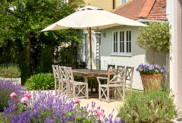 Outside table, umbrella and sunshine. Suffolk image